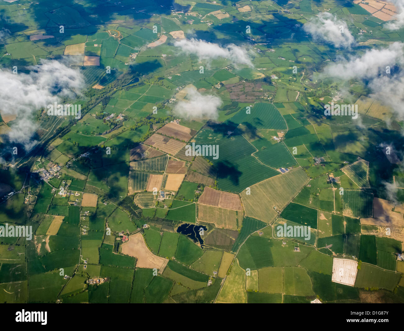 Aerial view of the green fertile fields near Porto Portugal with clouds