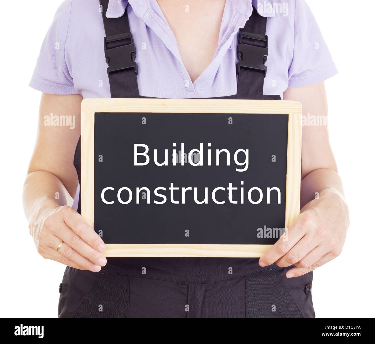 Craftsperson with blackboard building construction Stock Photo Alamy