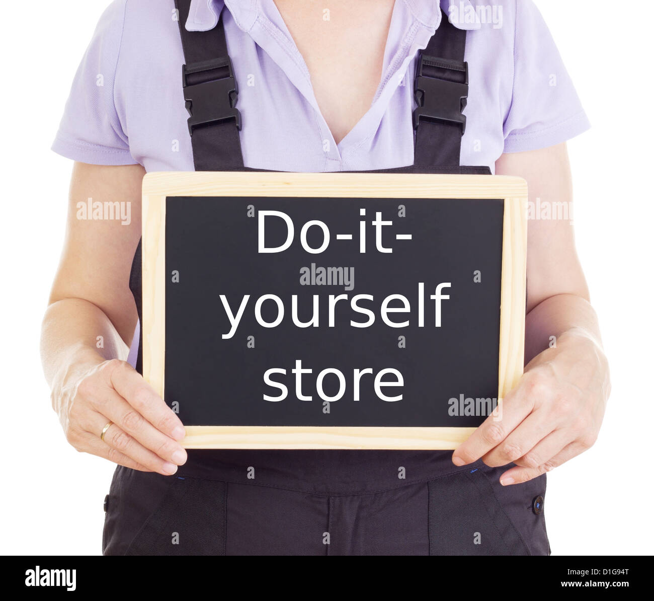 Craftsperson with blackboard doityourself store Stock Photo Alamy