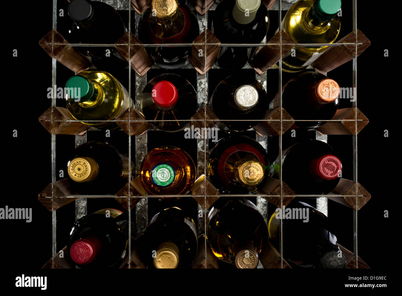 Wine bottles in a wine rack in a cellar. Stock Photo