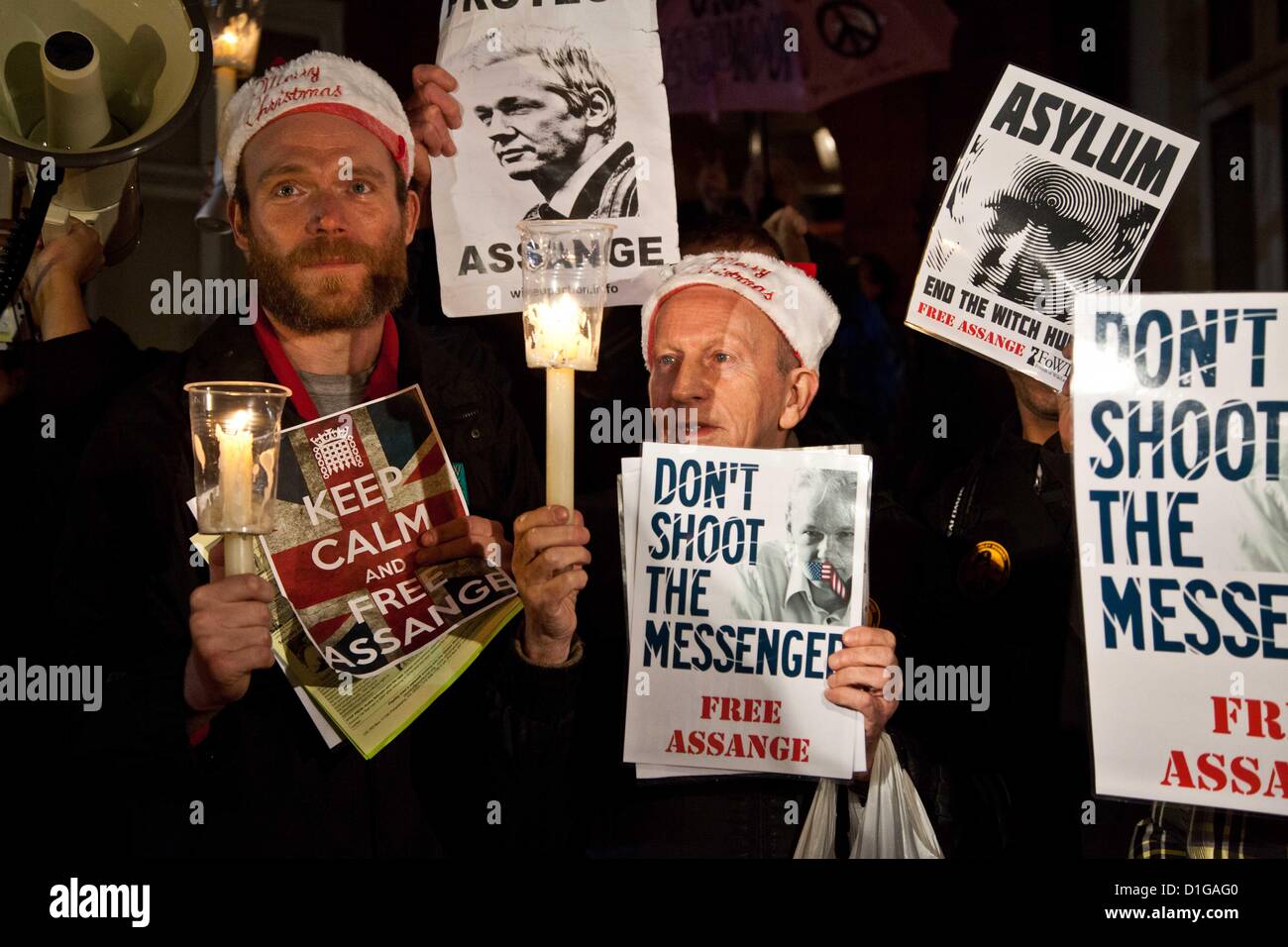 London, UK. 20th December 2012 Julian Assange supporters gathered outside the Ecuadorian Embassy to hear him make a speech. Stock Photo