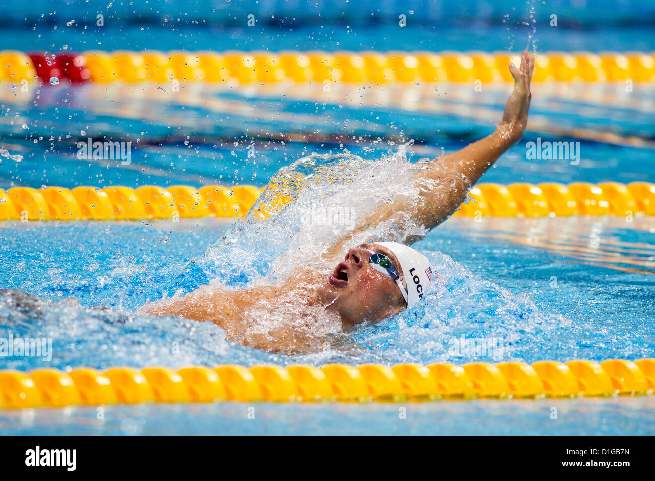 Ryan Lochte (USA) competing in the backstroke leg of the Men's 400m Individual Medley Heat at the 2012 Olympic Stock Photo