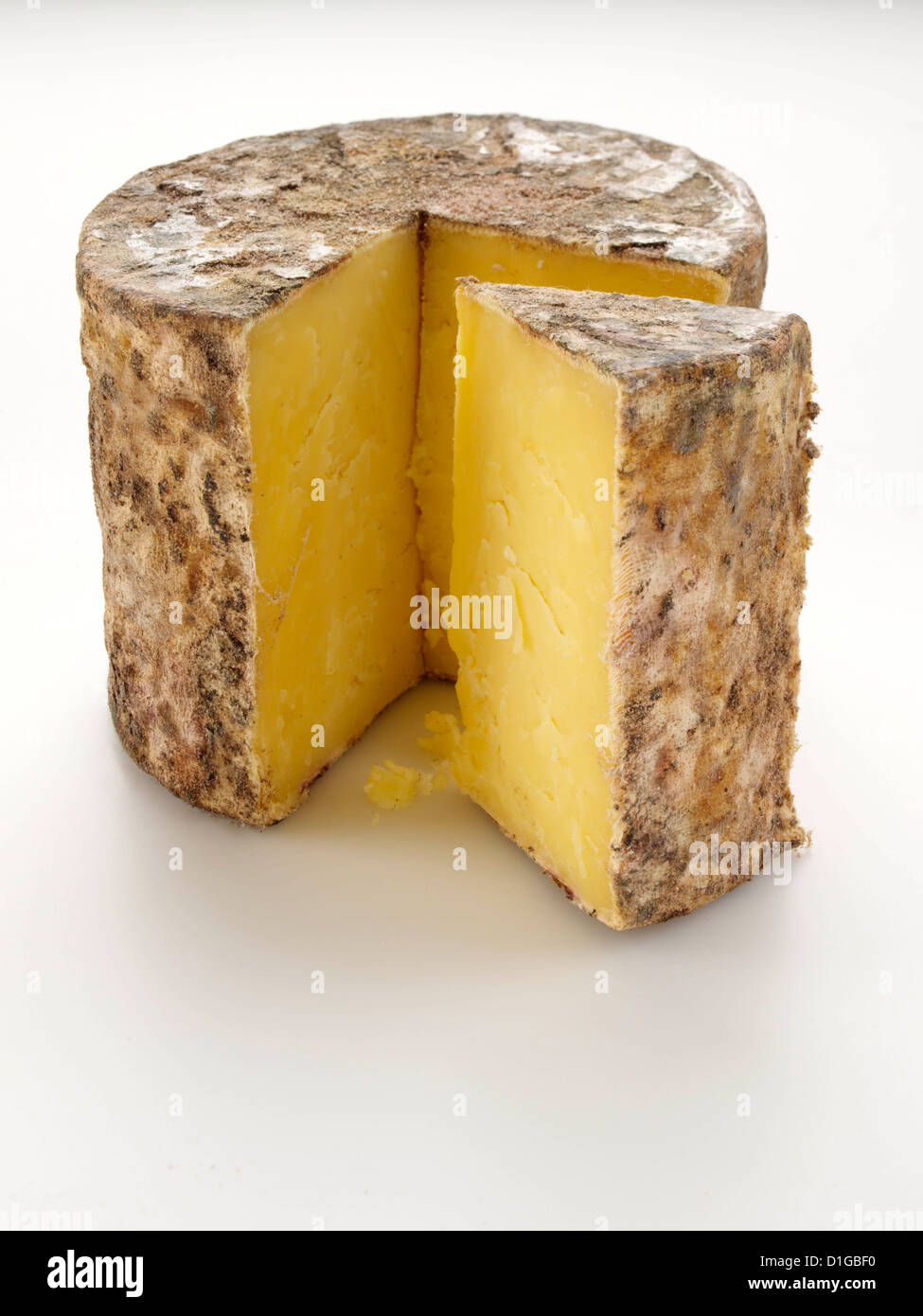 Cave aged traditional cloth wrapped mature cheddar cheese Stock Photo