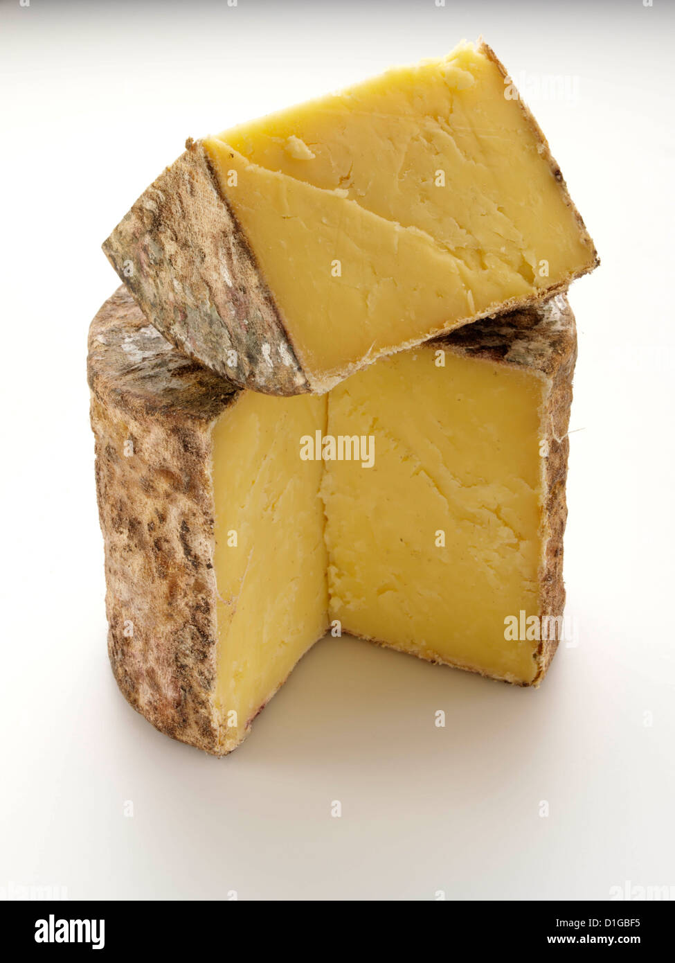 Cave aged traditional cloth wrapped mature cheddar cheese Stock Photo