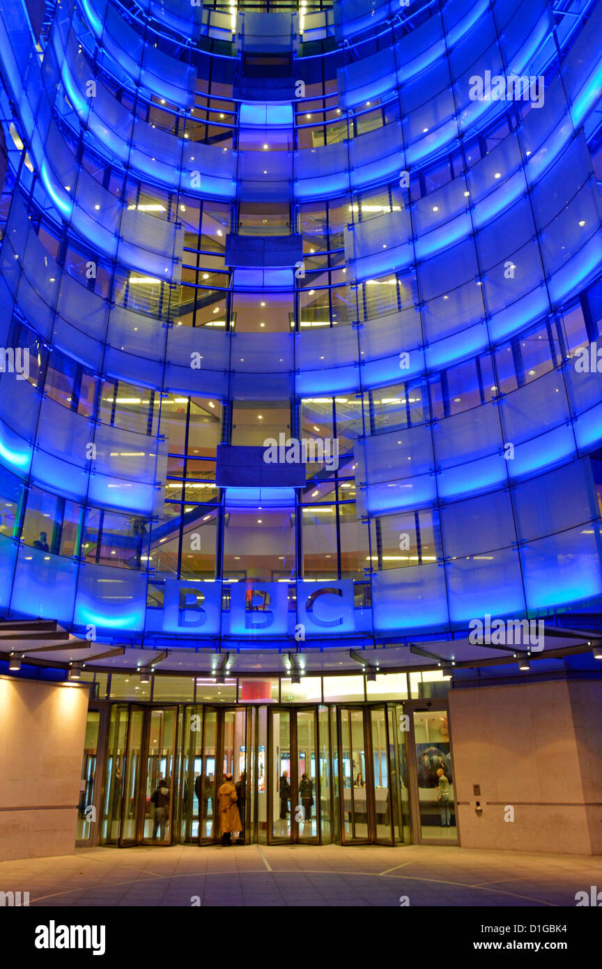 Broadcasting House entrance at night with new east wing extension and BBC logo sign Stock Photo