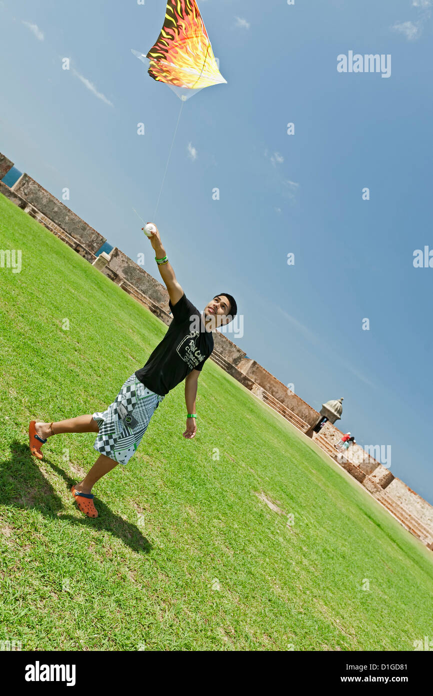 Boy flying kite, El Morro grounds, Old San Juan, Puerto Rico Stock