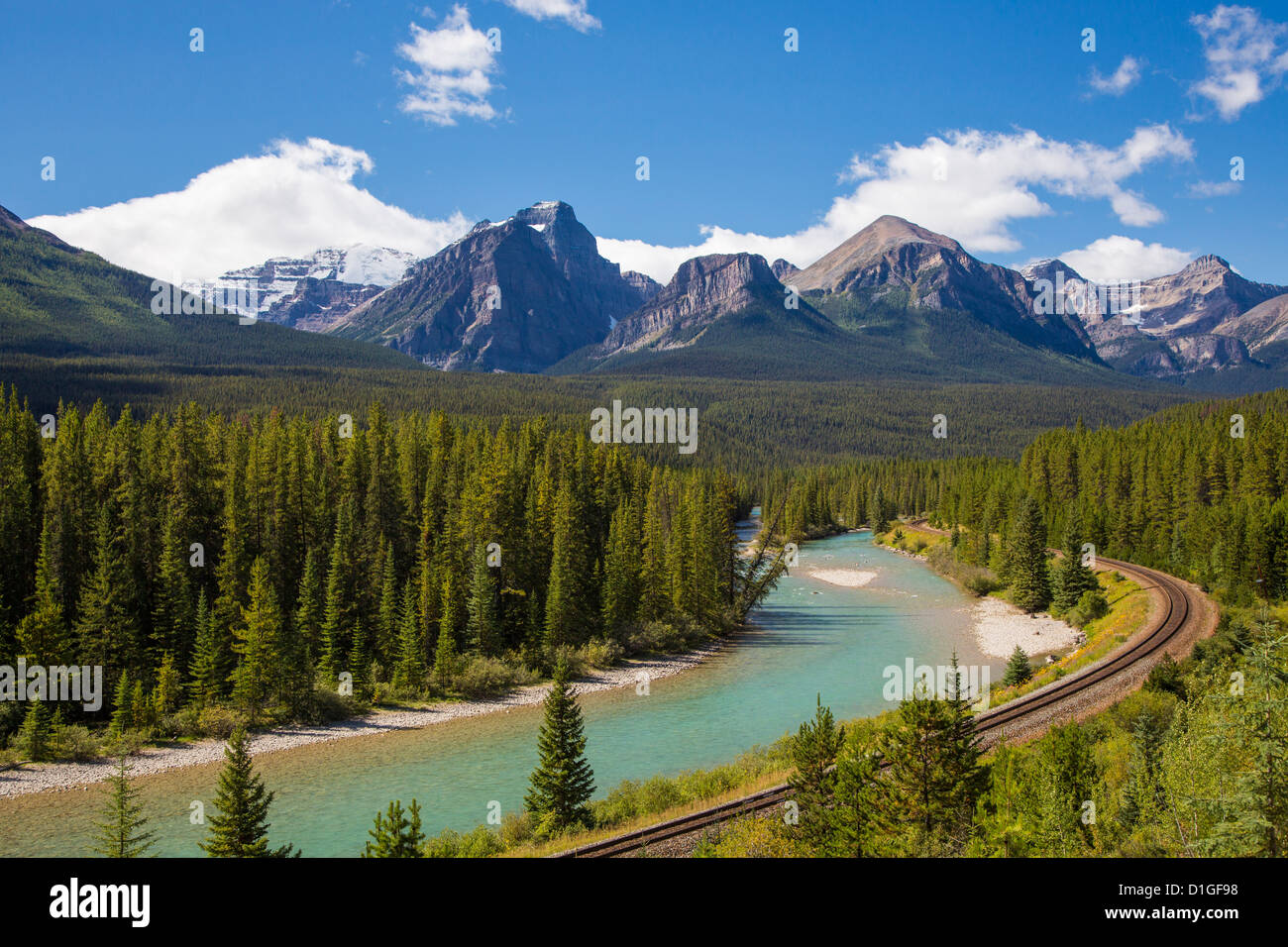 Bow River and railway along the Bow Valley Parkway in Banff National Park in Alberta Canada Stock Photo