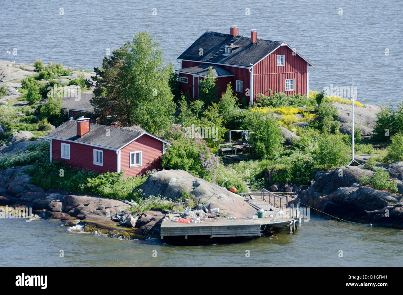 Houses and jetty on island near Helsinki, Finland, Scandinavia, Europe Stock Photo