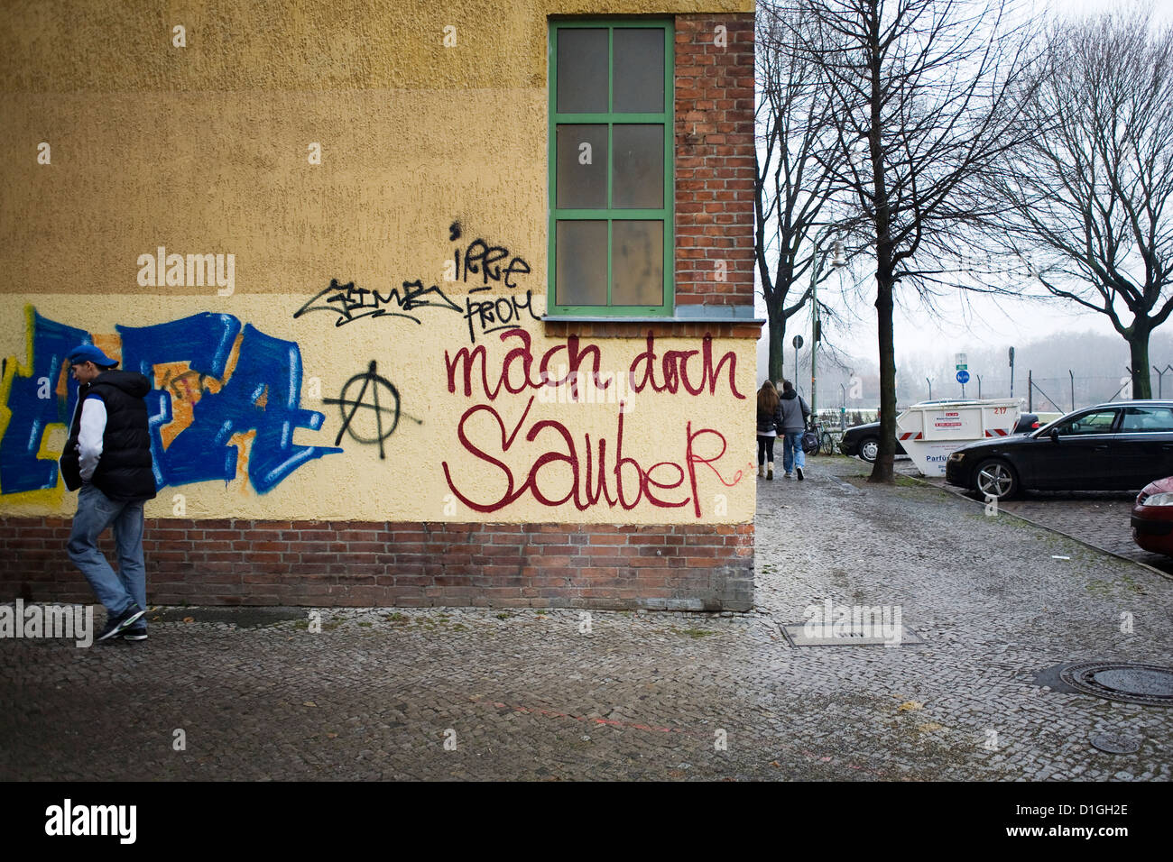 The message 'clean up' is sprayed on the wall of a building in Berlin-Neukoelln, Germany, 19 December 2012. Photo: Inga Kjer Stock Photo