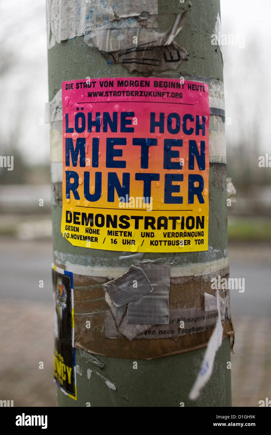A sticker reading 'Incomes high, rents lower' is stuck to a lightpost in Berlin-Neukoelln, Germany, 19 December 2012. Photo: Inga Kjer Stock Photo
