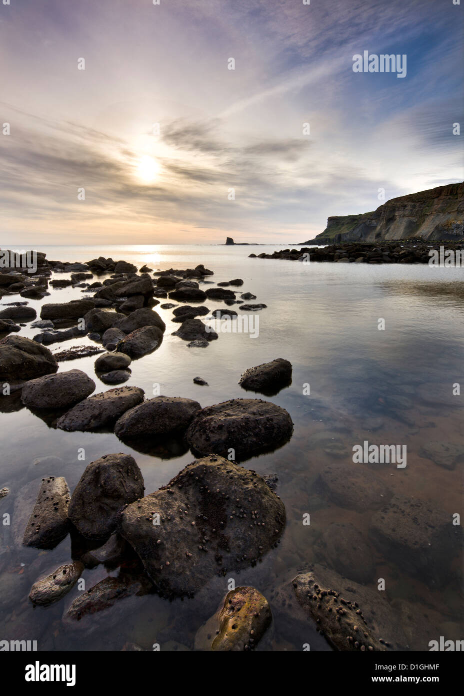 Incoming tide and clouds at Saltwick Bay, North Yorkshire, Yorkshire, England, United Kingdom, Europe Stock Photo