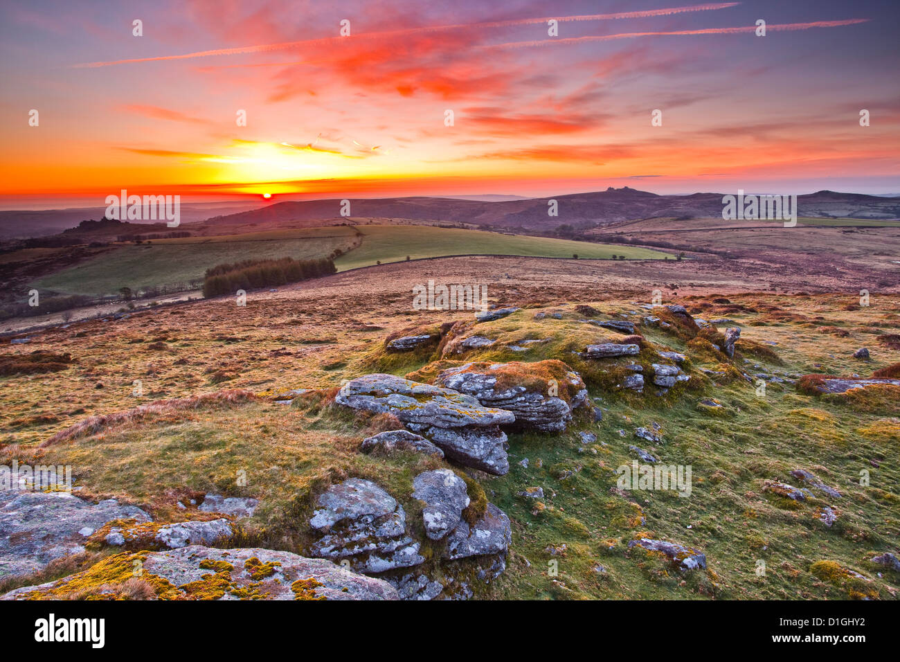 A colourful dawn on Chinkwell Tor in Dartmoor National Park, Devon, England, United Kingdom, Europe Stock Photo