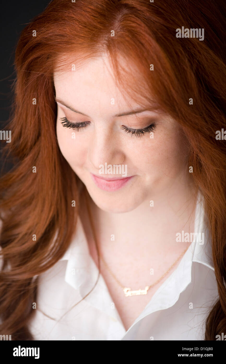 Portrait of a girl with long red hair Stock Photo - Alamy