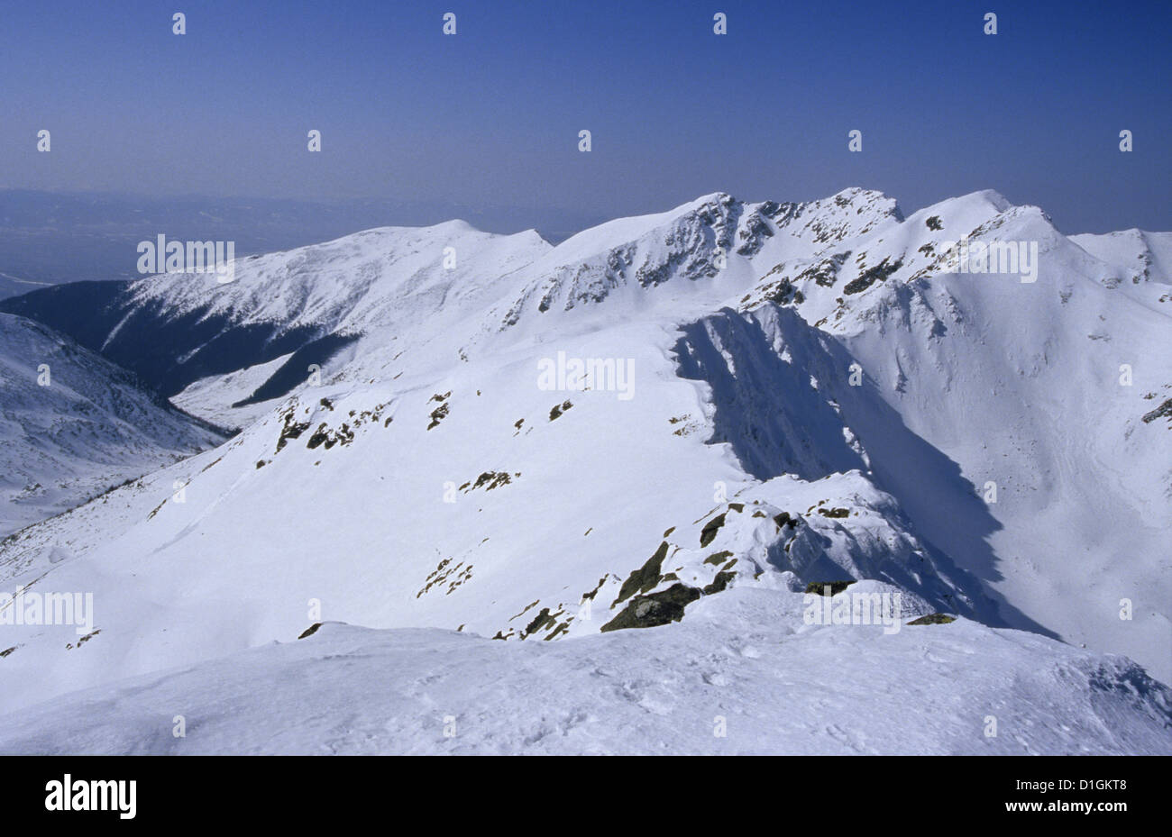 View of the main ridge of Rohace mountains from the summit of Placlive, Zapadne Tatry, High Tatras National Park, Slovakia. Stock Photo