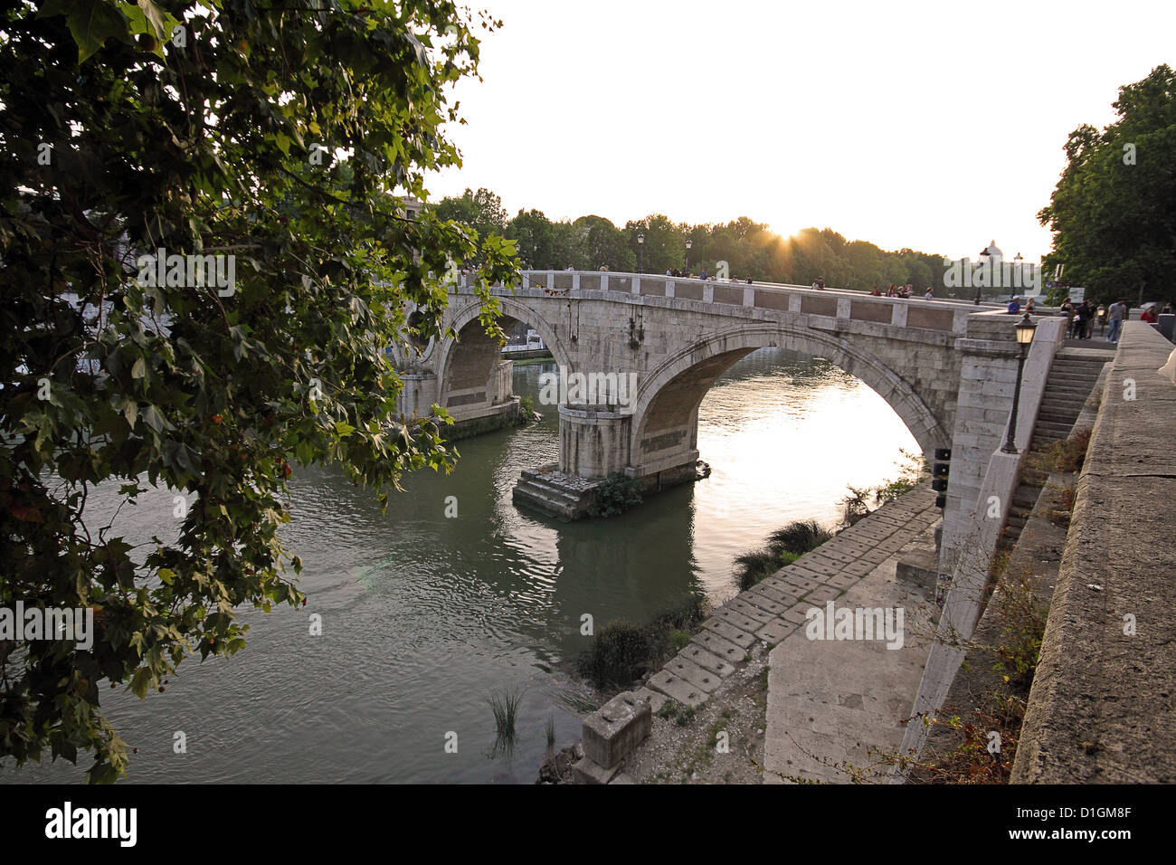 Sunset on the Tiber, the river of Rome, and it's bridges Stock Photo