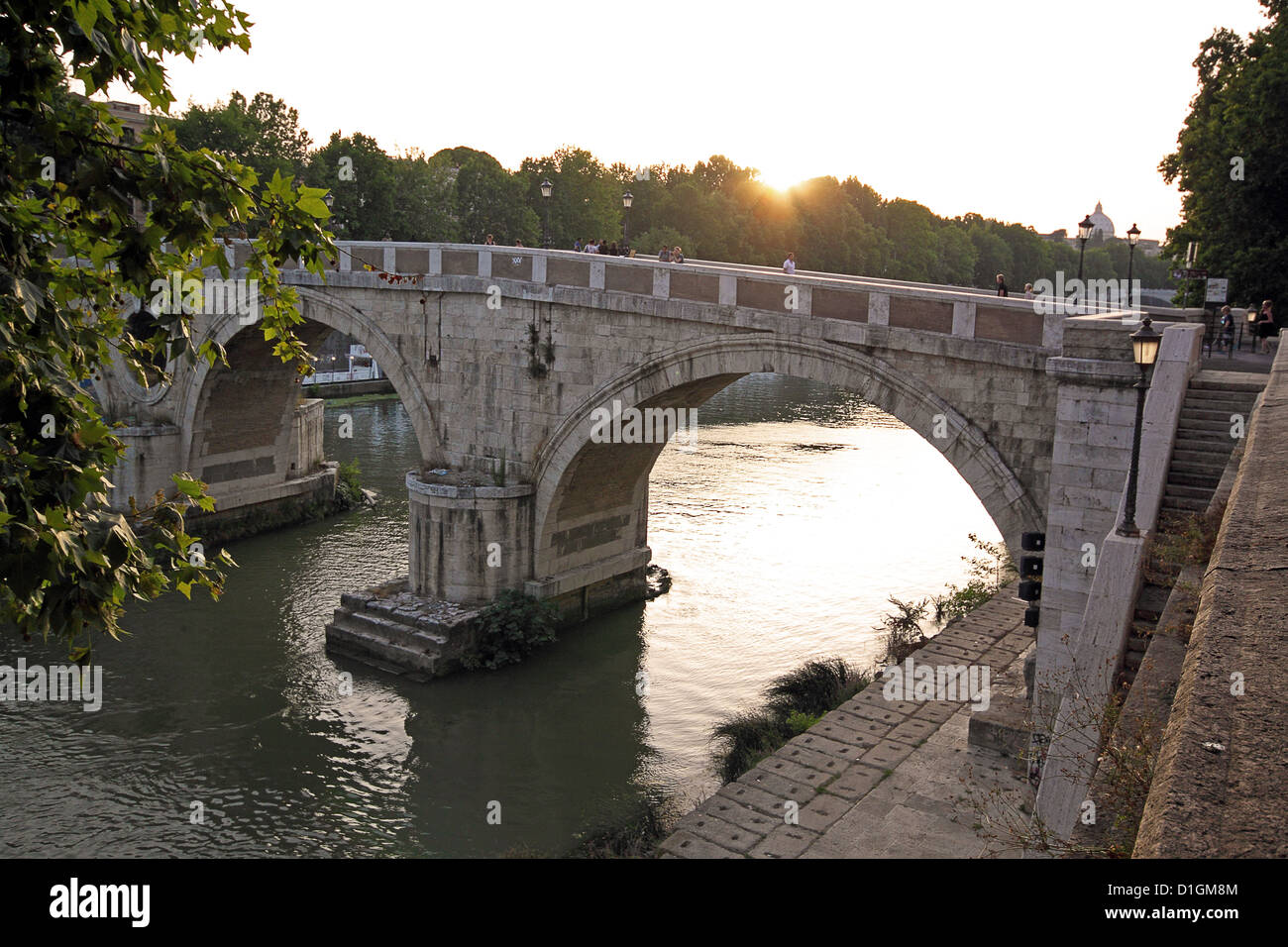 Sunset on the Tiber, the river of Rome, and it's bridges Stock Photo
