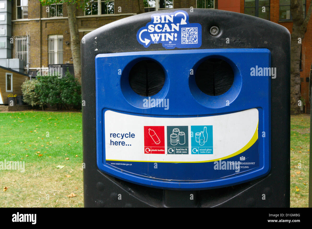 A bottle and can recycling bank with a competition entered by scanning a QR code by mobile 'phone. Stock Photo