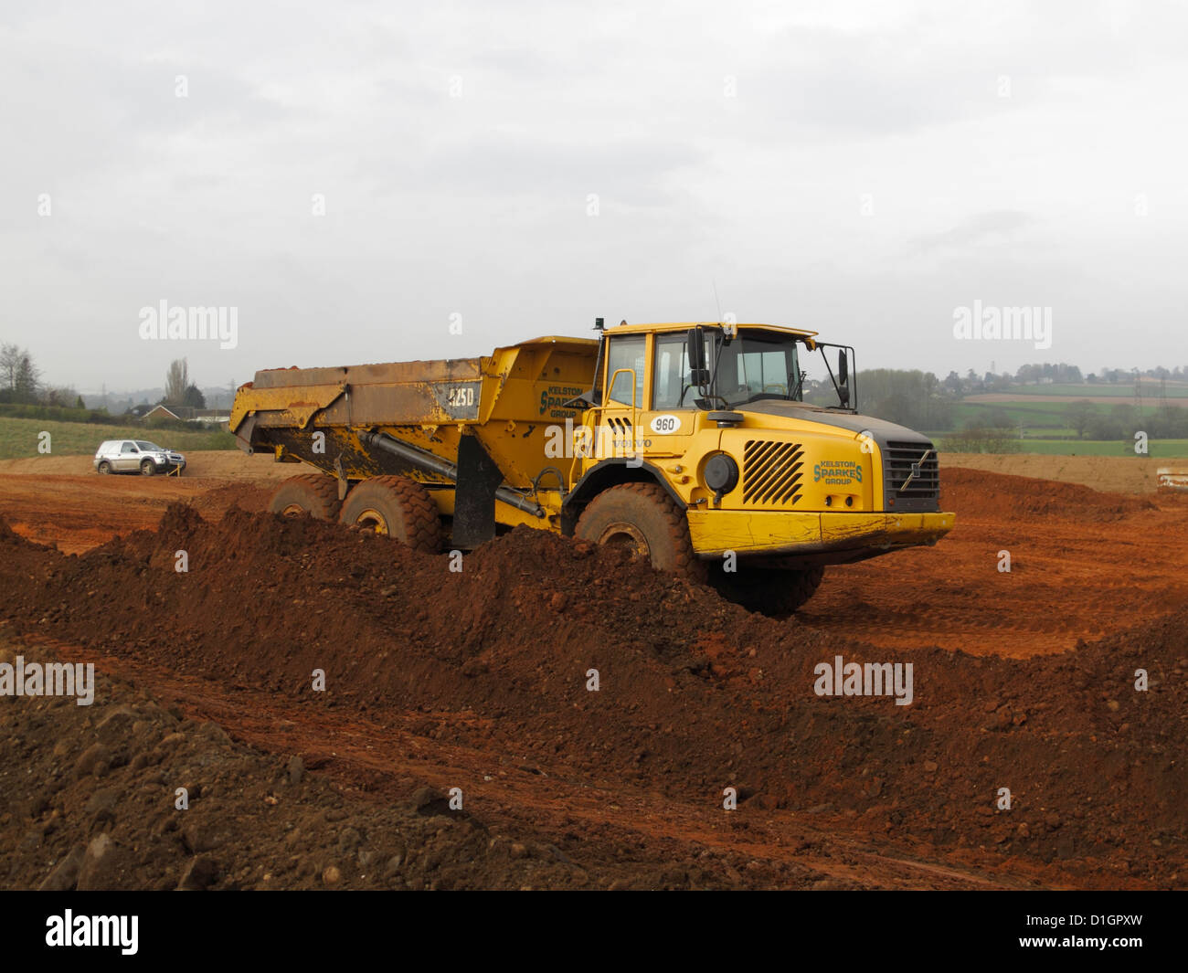 Volvo BM six wheeled dump truck earthmoving earthworks muckshift new road building construction site uk Stock Photo
