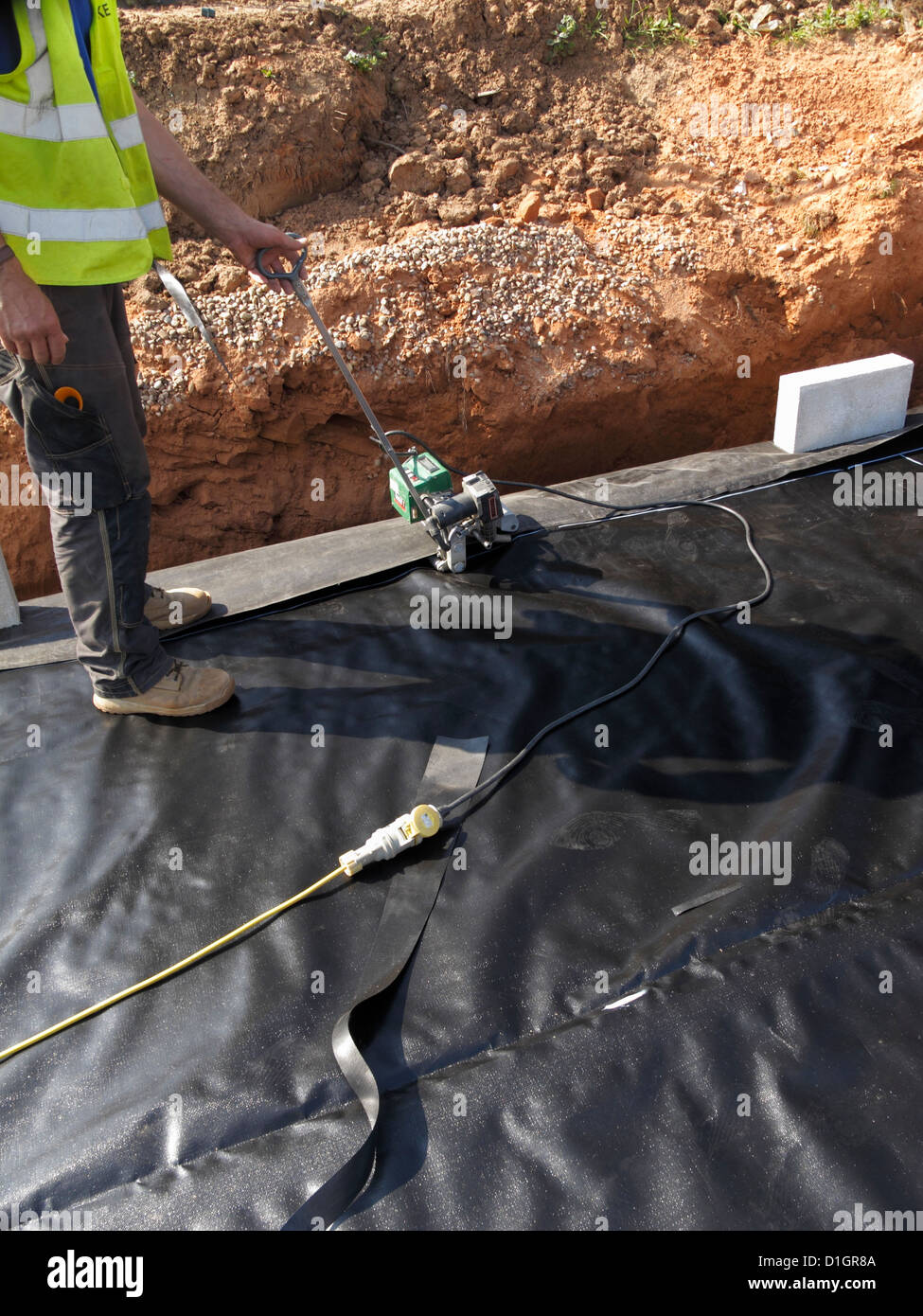 In situ plastic welding joining sheet waterproofing membrane around