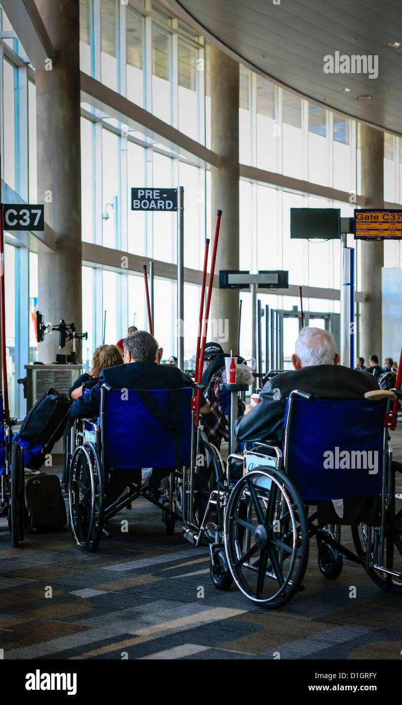 Wheelchairs at airport hires stock photography and images Alamy
