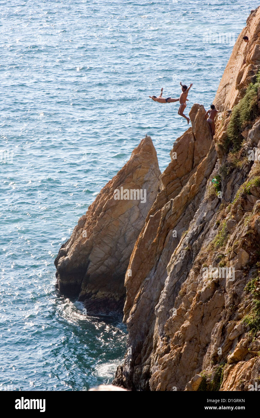 Cliff Divers jump at La Quebrada, Acapulco, Guerrero, Mexico. Stock Photo