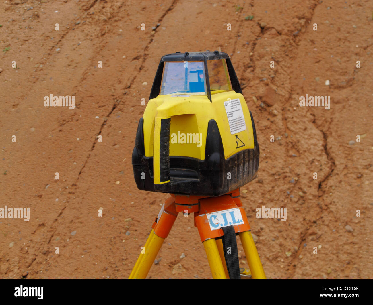 Tripod mounted self leveling rotating laser level for setting out work