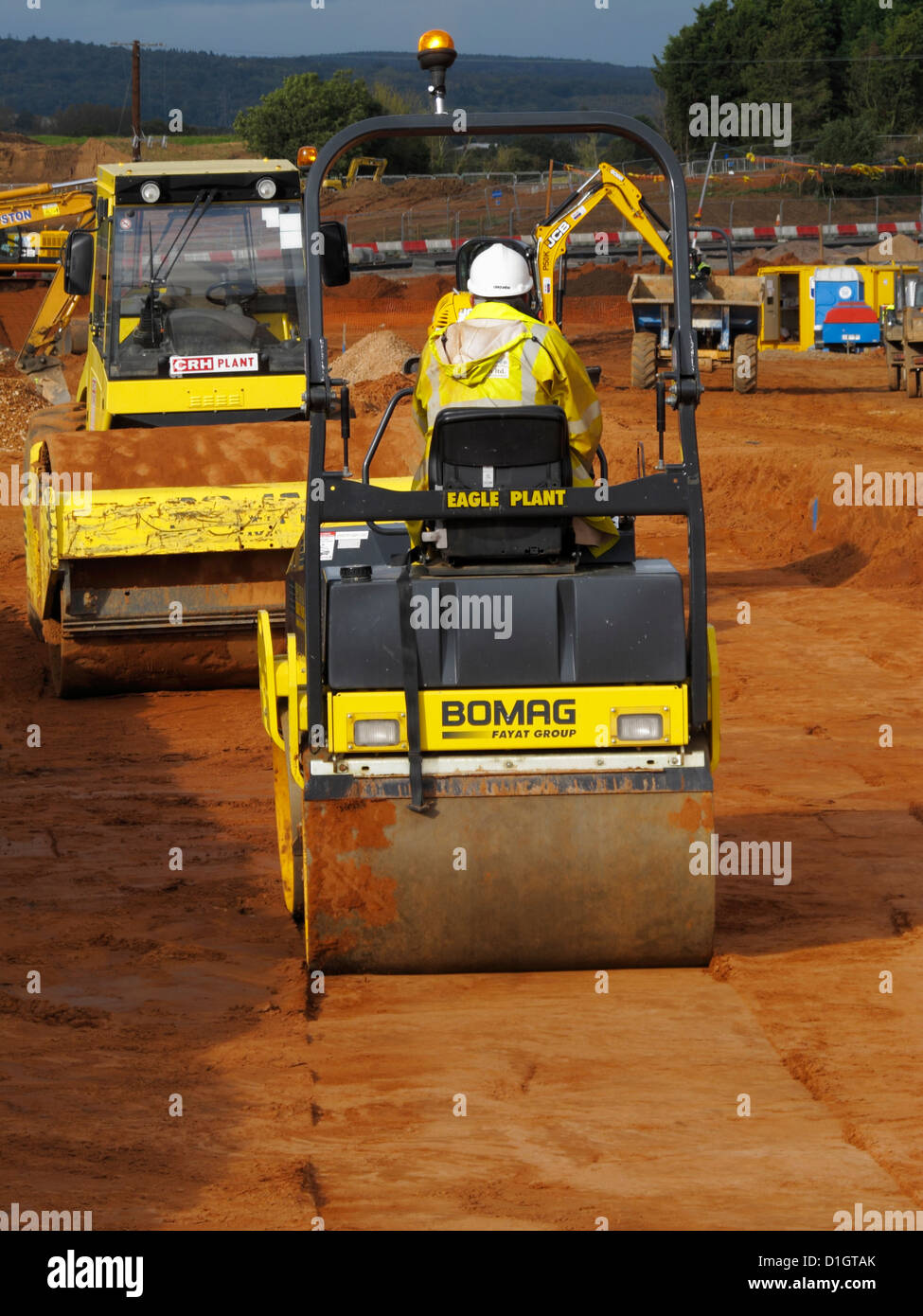 Bomag road roller compacting compaction of fill soil during earthworks