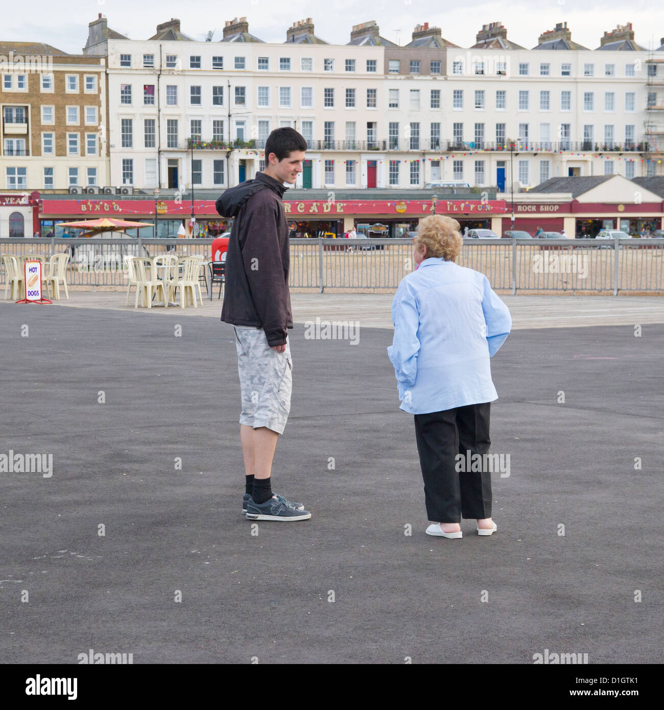 Grandmother and Grandson Chatting and Strolling Stock Photo