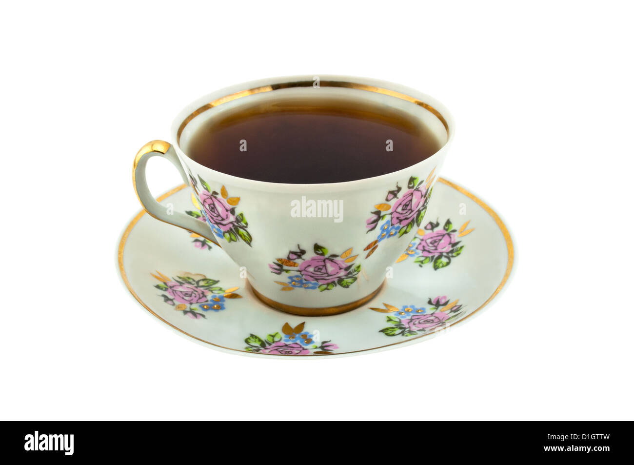 a full teacup and saucer isolated on white Stock Photo Alamy