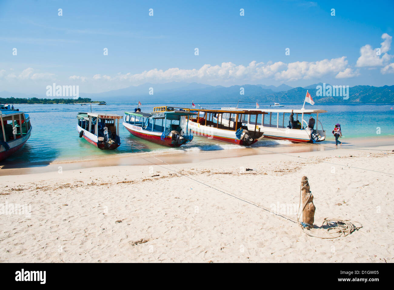 Gili Trawangan harbour, traditional Indonesian boats moored up, Gili Islands, Indonesia, Southeast Asia, Asia Stock Photo