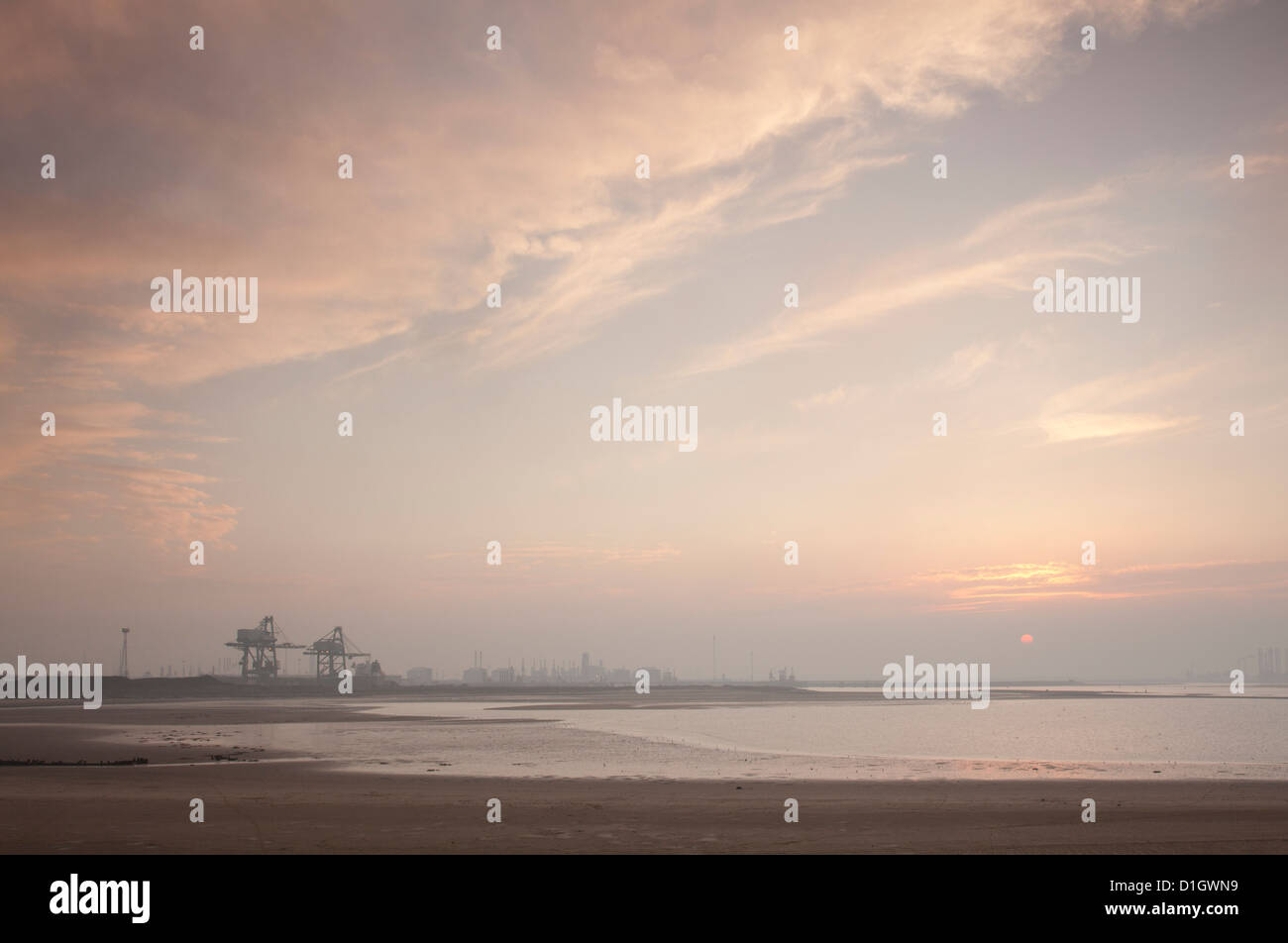 Teesside heavy industry seen from the South Gare of the River Tees at sunset. Stock Photo