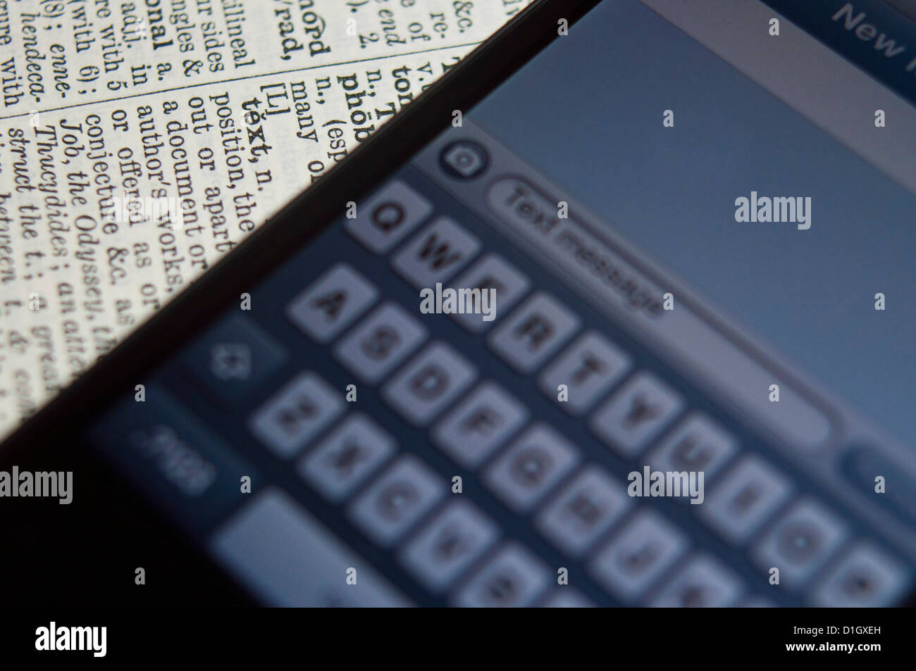 Mobile i phone text message spelling on a dictionary Stock Photo Alamy