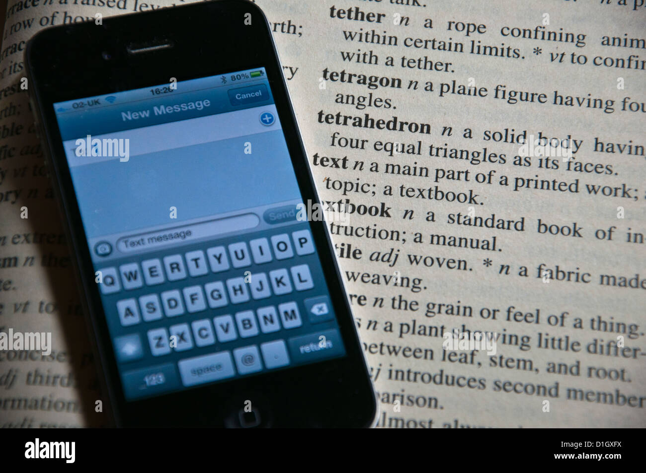 Mobile i phone text message spelling on a dictionary Stock Photo Alamy
