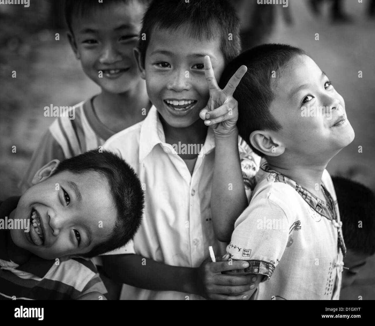 Cheeky Vietnamese children play up for the the photographer Stock Photo ...