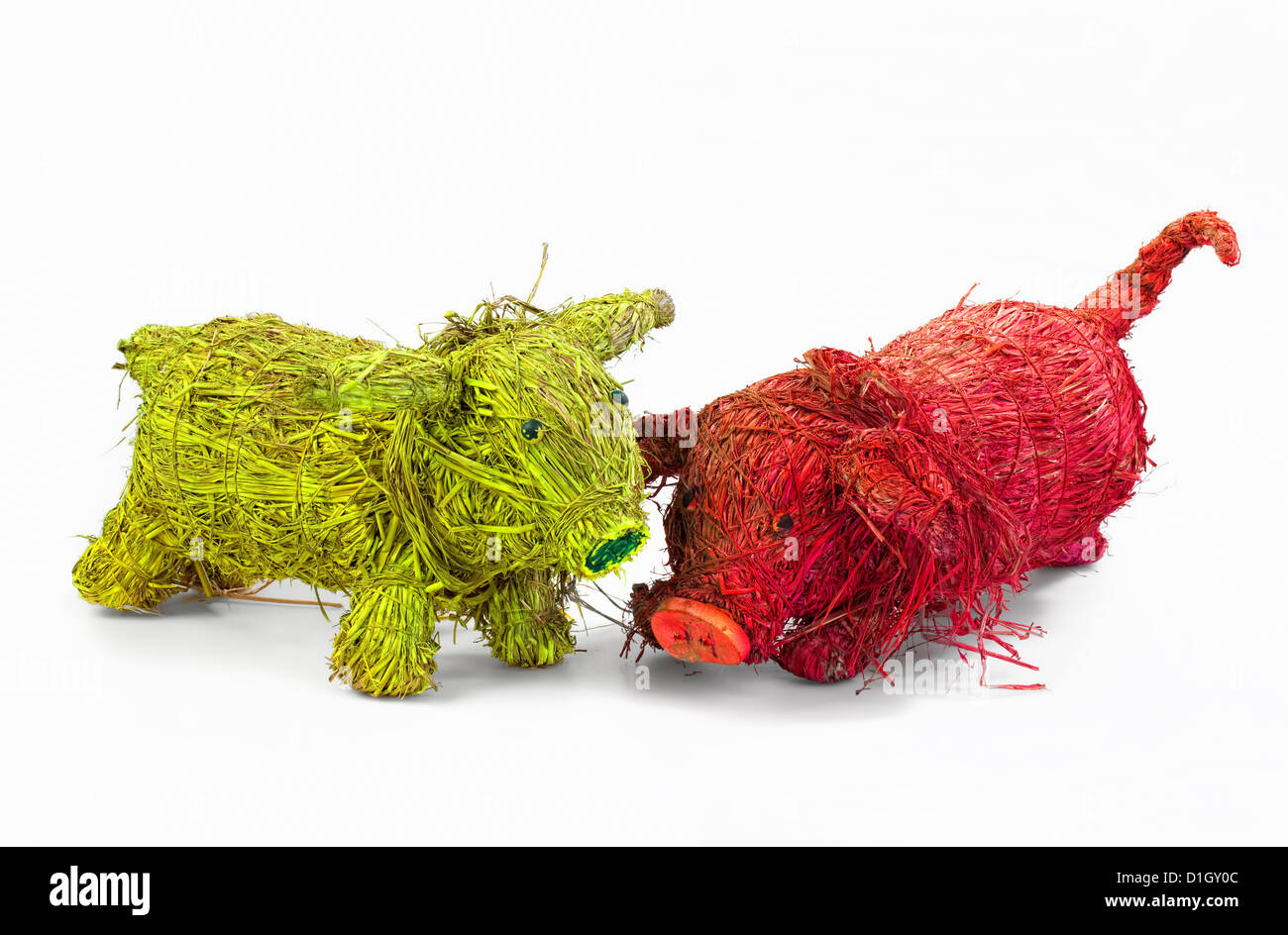 Piglets, handicraft work, coloured straw, Aus gefärbtem Stroh gebastelte kleine Schweine oder Ferkel Stock Photo