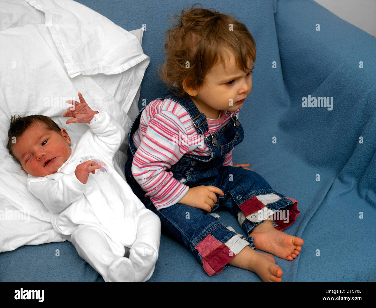 Sisters Eighteen Months Old and Two Days Old Stock Photo