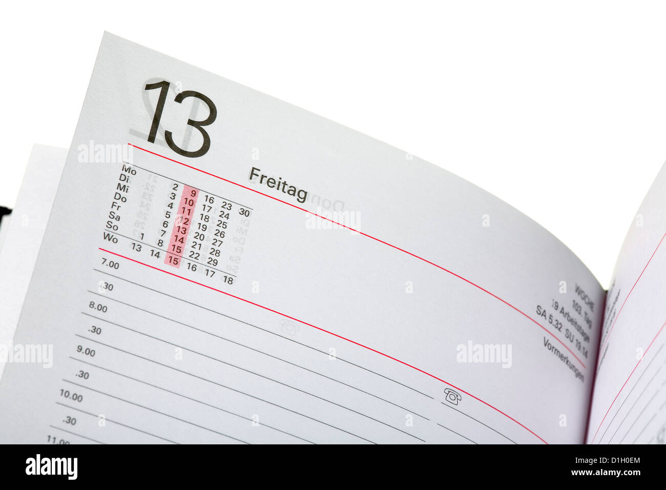 Close up of a open diary - 13 friday (german - Freitag), isolated on white background Stock Photo
