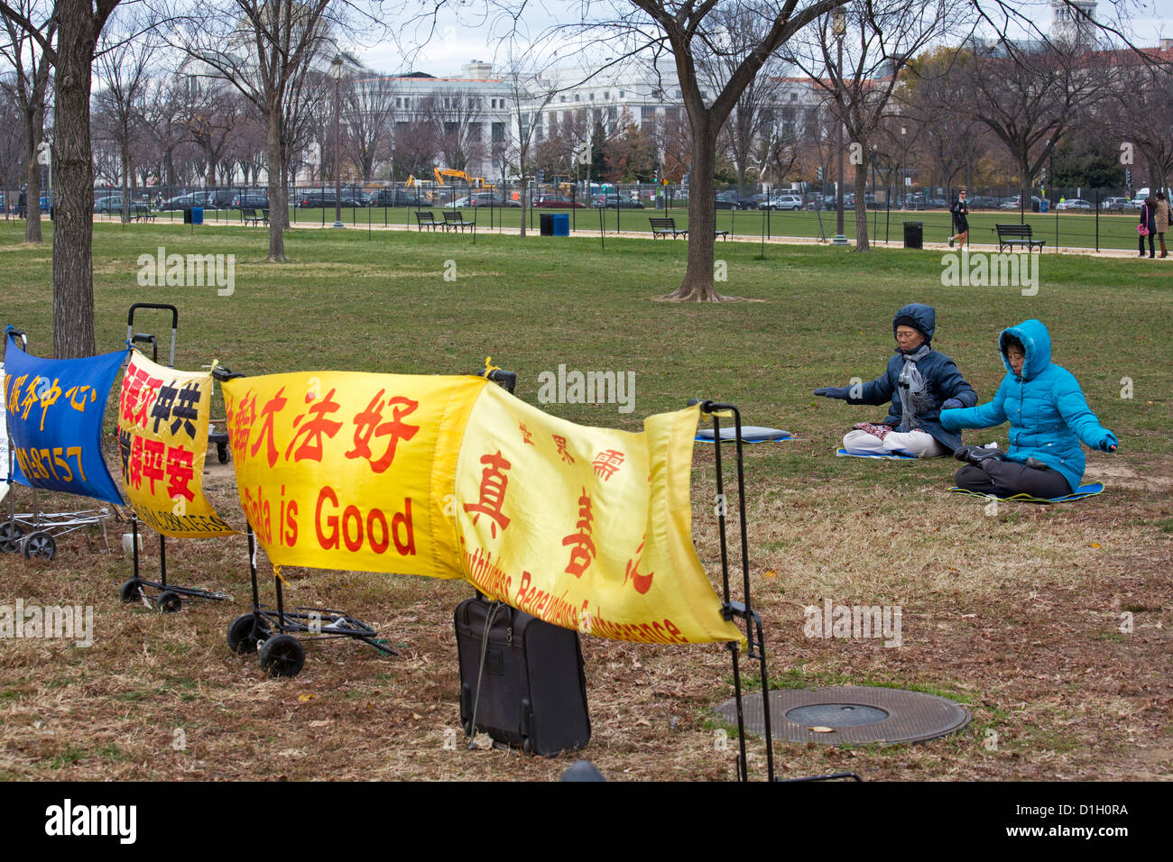 Washington, DC - Falun Gong practitioners meditate on the national mall. Stock Photo