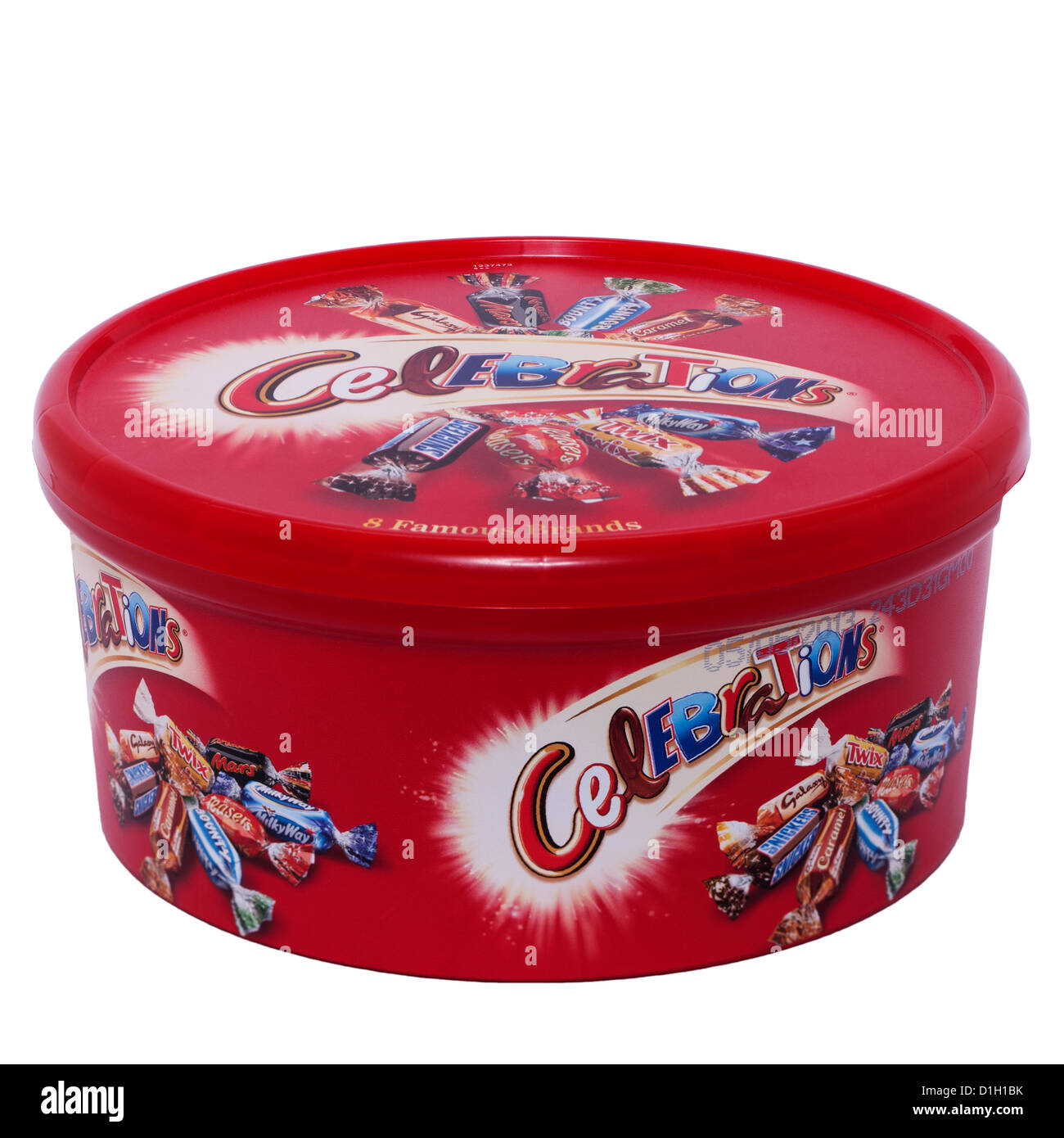 A tub of celebrations sweets on a white background Stock Photo