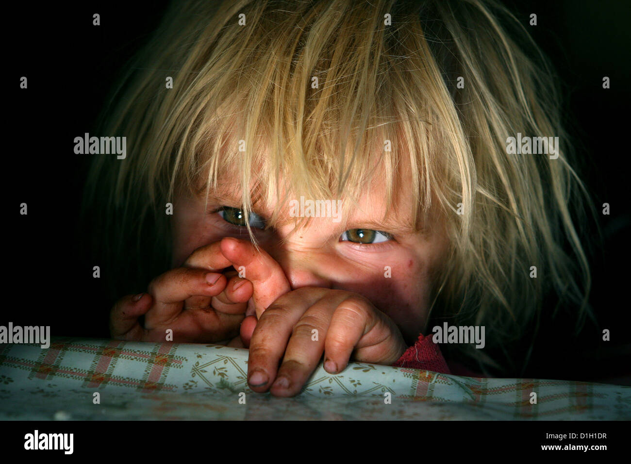 portrait of a blond boy dirty face toddler, child, kid 3-4 years old Stock Photo