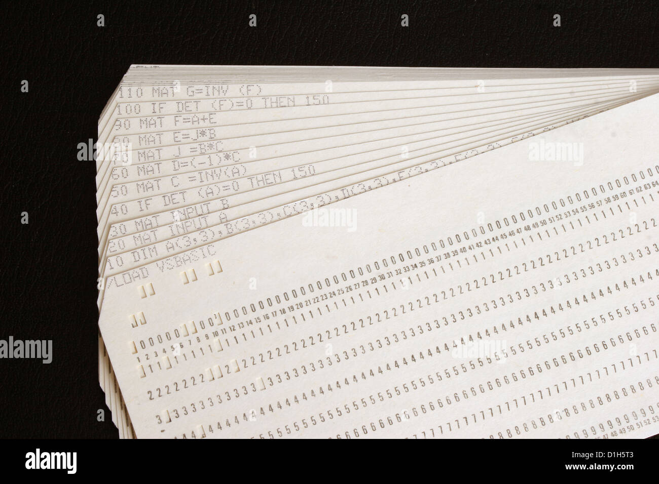November 2012 - A set of computer punch cards from the 1970's, way before the invention of the key board, mouse and screen. Stock Photo