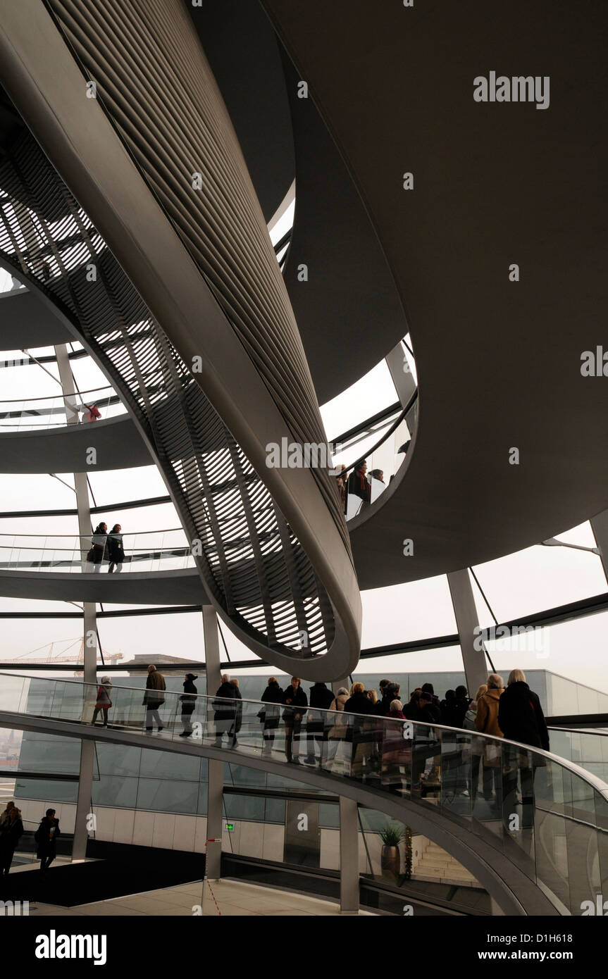 Visitors inside the Reichstag Dome in Berlin, designed by Norman Foster Stock Photo