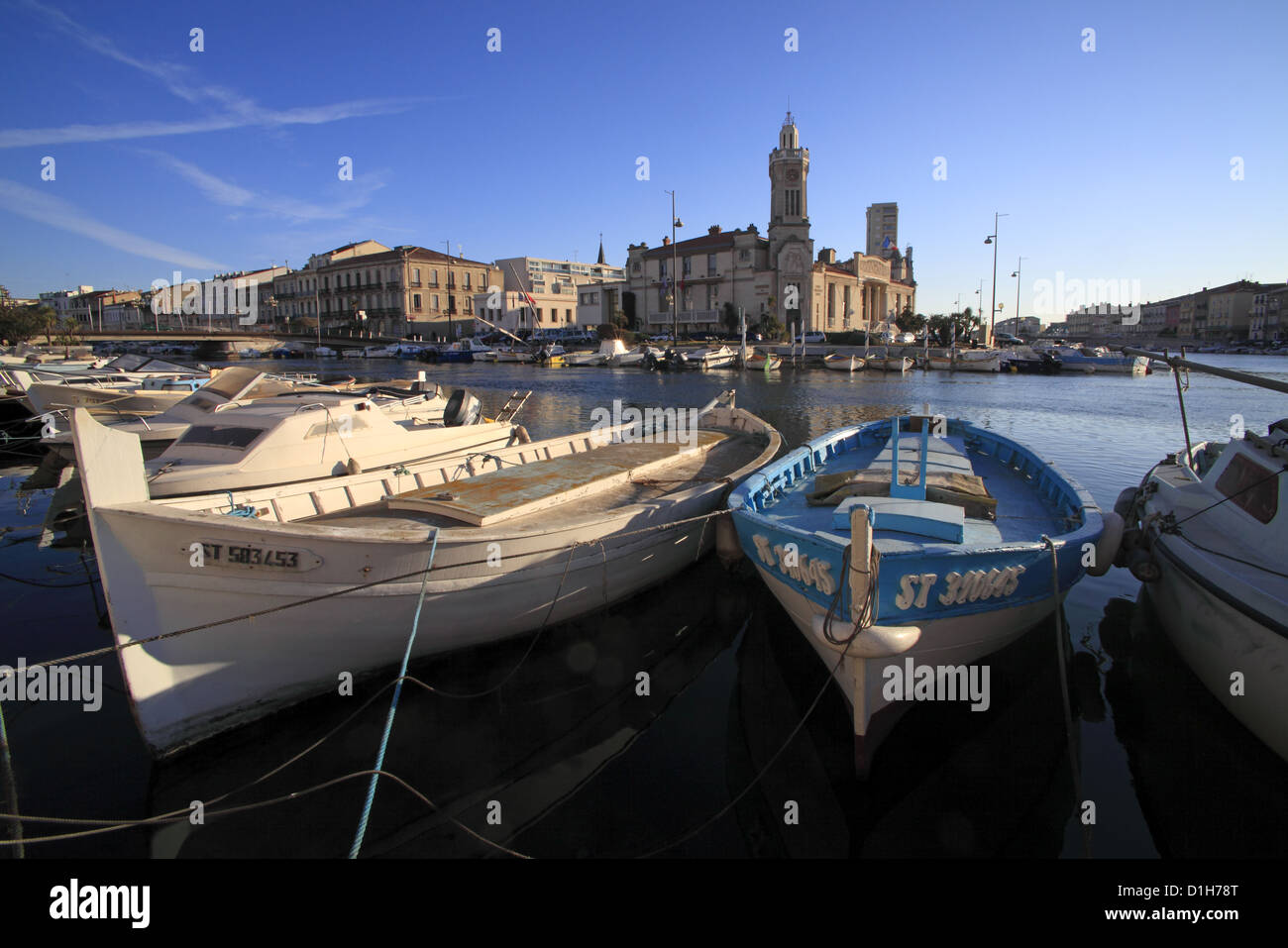 Boats on the canal near the Chamber of trades in Sete, Languedoc Roussillon, France Stock Photo