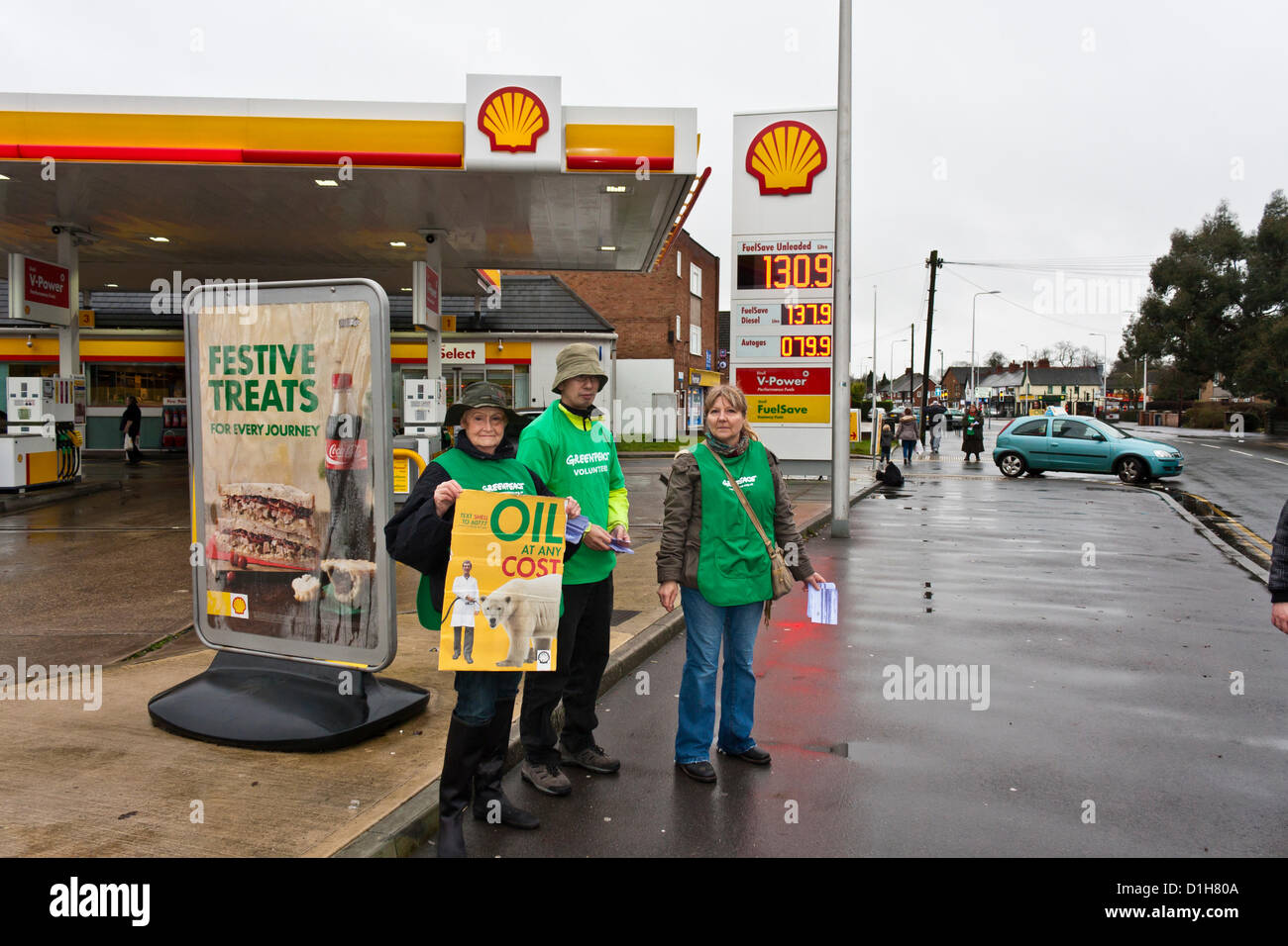 Greenpeace campaigners protesting outside a Shell filling station. Stock Photo