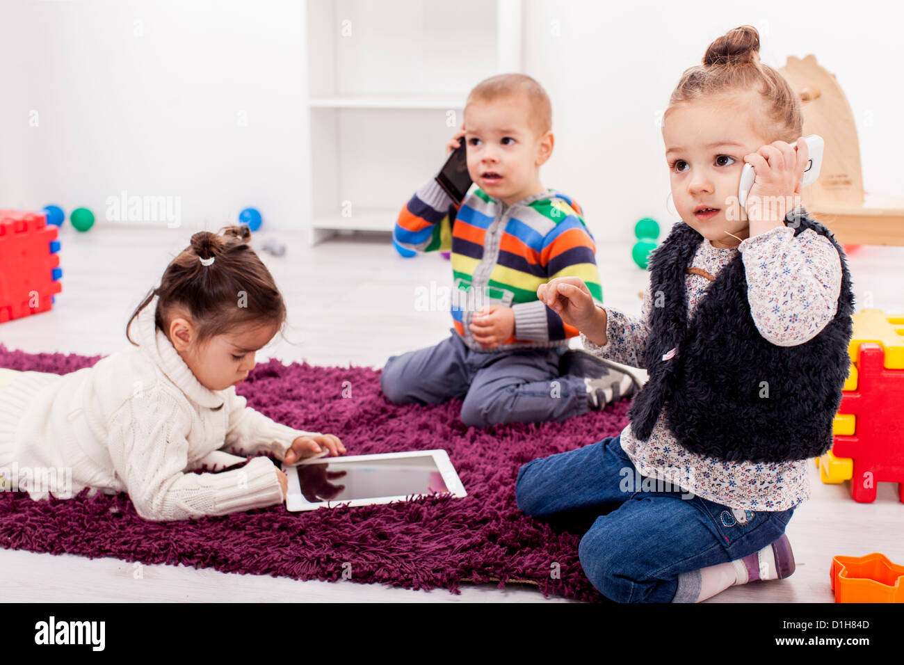 cute-kids-playing-in-the-room-stock-photo-alamy