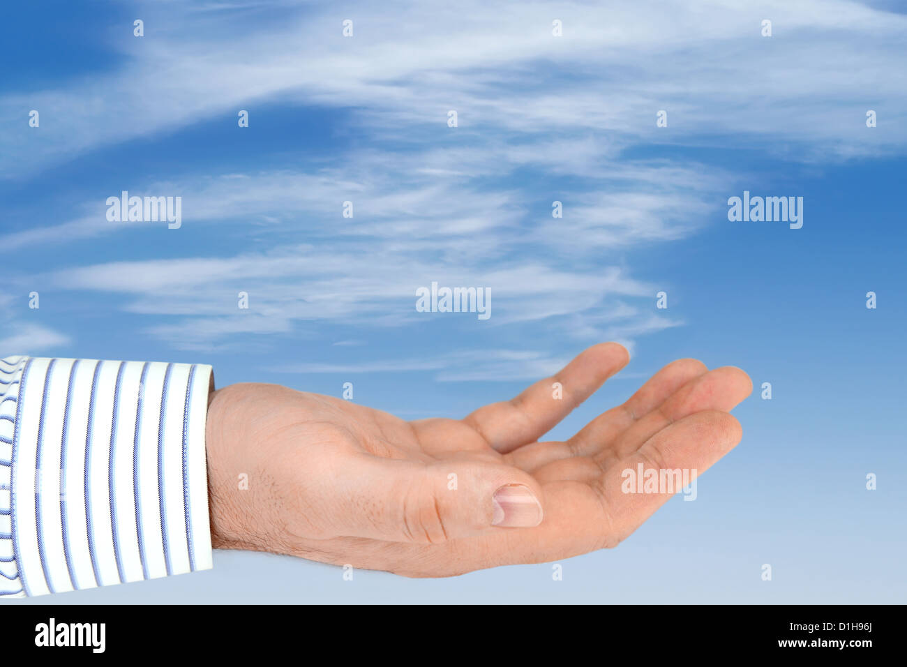 Male Hand on the Blue Sky Background Stock Photo - Alamy