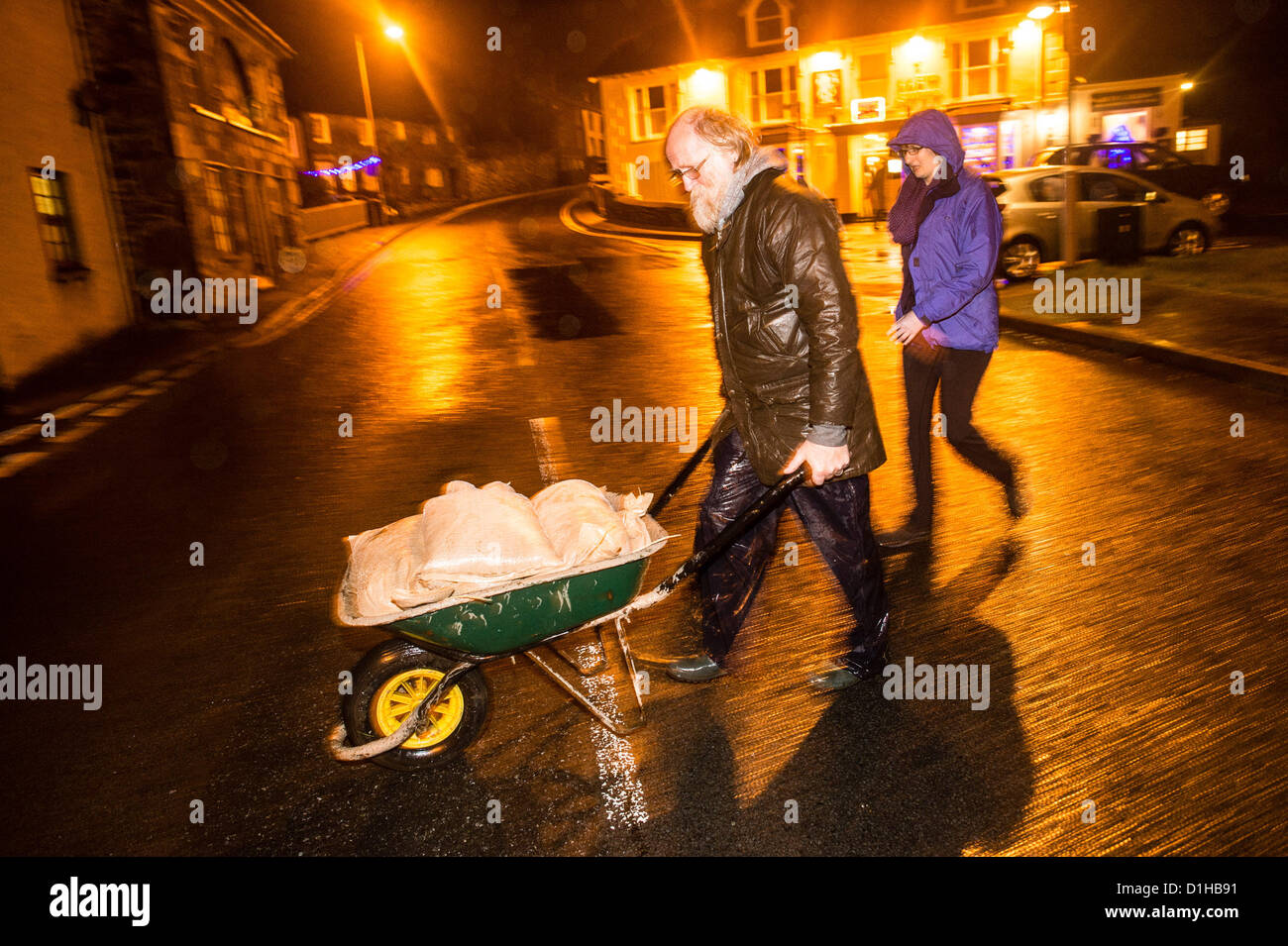 Saturday December 22 2012. Talybont, Near Aberystwyth, Ceredigion Wales UK.  After a day of prolonged heavy rain, the River Leri has again risen to levels that are causing anxiety in this village, which suffered devastating damage in the floods of 7/8 June 2012. The local authority provided sandbags for local residents to protect their properties, and the Environment Agency was predicting that the river levels would soon start to fall once the rains had ceased  Photo ©keith morris. Stock Photo