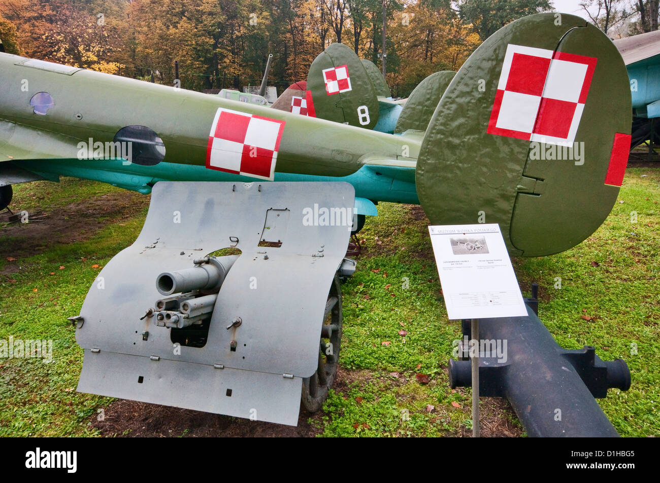 76 mm Mountain Gun Model 1909, tail of Petlyakov Pe-2, Soviet WWII bomber aircraft behind, Polish Army Museum in Warsaw, Poland Stock Photo