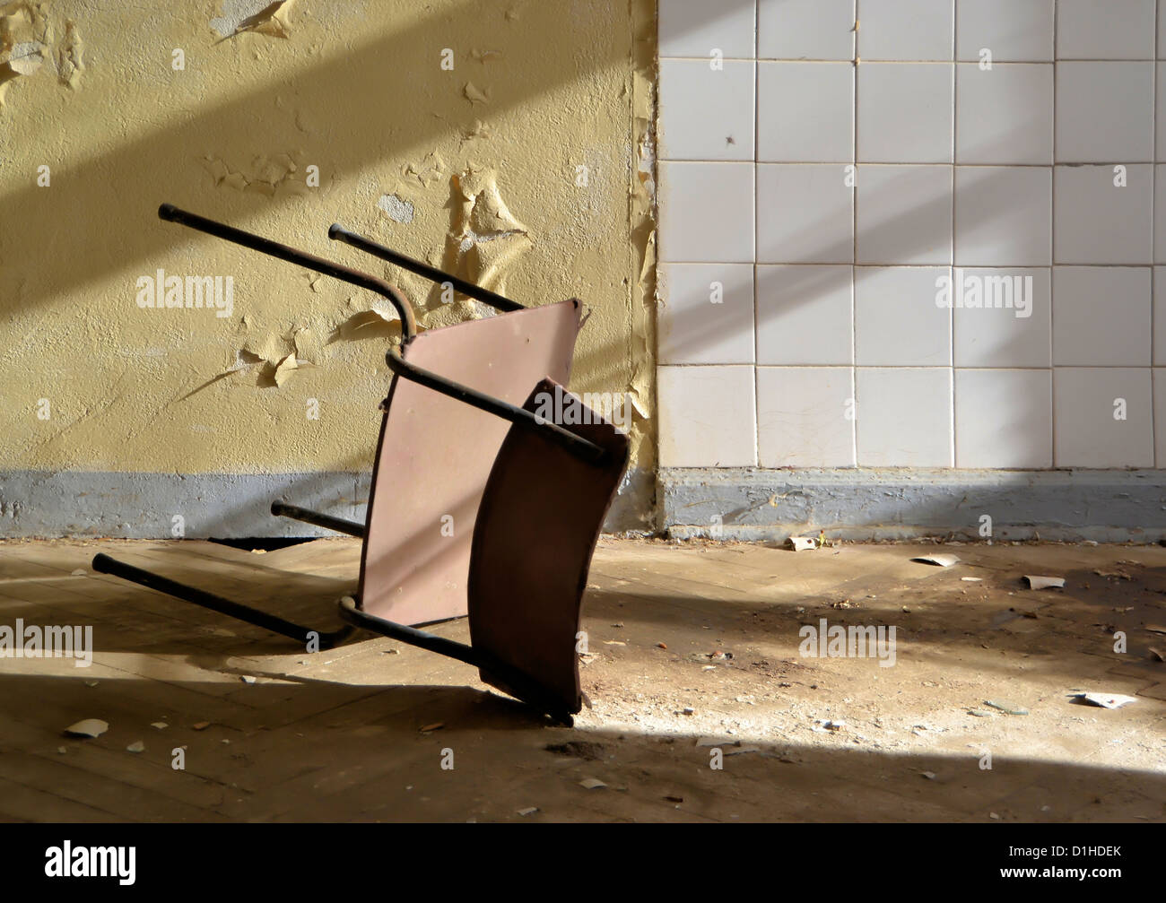Chair in an abandoned building Stock Photo