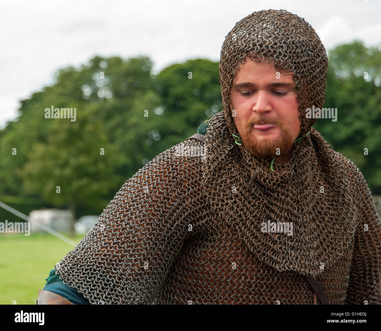Man dressed in Chain Link Medieval Armour, Chainmail Links. View from the front. Close up Stock Photo